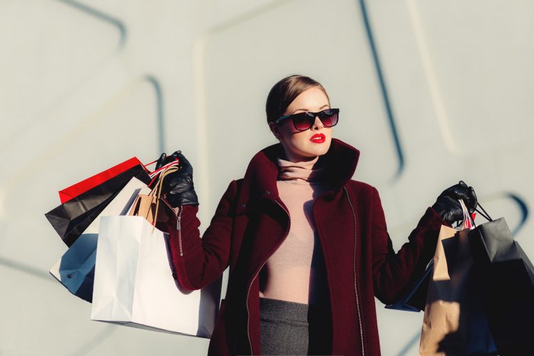 A haggler carrying shopping bags